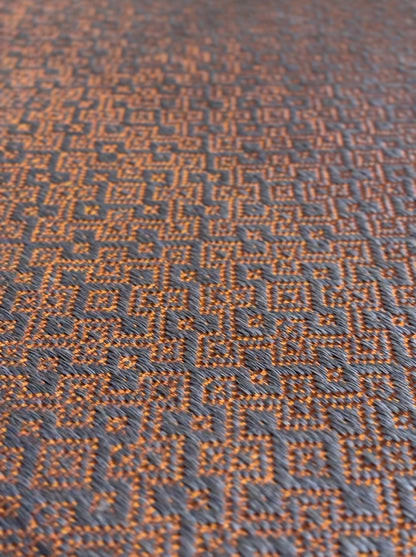 Martina Woven Rug inverted in Fique and Copper / F42